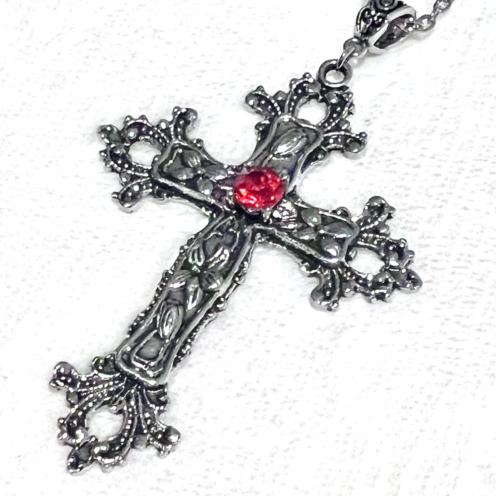 Silver Toned Cross Pendant with Red Gemstone